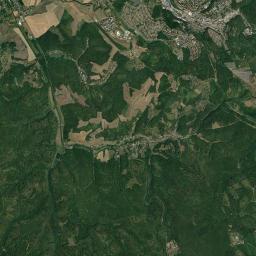 Komló Satellite Map