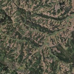 San Juan de la Costa Satellite Map