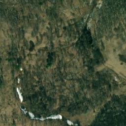 Satellite imagery of Логовской, RU