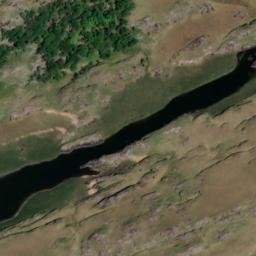 Satellite imagery of Man of War Rock, IE