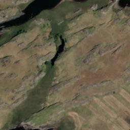 Satellite imagery of Man of War Rock, IE