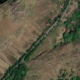 Satellite imagery of Man of War Rock, IE