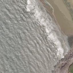 Satellite imagery of Sker Point, GB