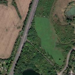 Satellite imagery of [Hostomice nad Bílinou] brickyard chimney, CZ