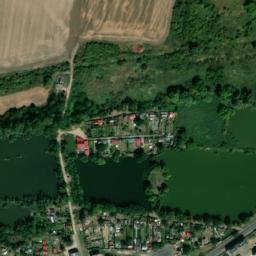 Satellite imagery of [Havraň] former suger factory chimney, CZ