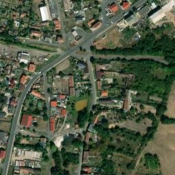 Satellite imagery of [Havraň] former suger factory chimney, CZ