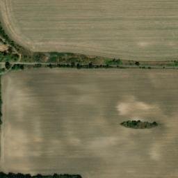 Satellite imagery of [Havraň] former suger factory chimney, CZ