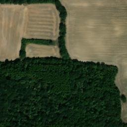 Satellite imagery of [Havraň] former suger factory chimney, CZ