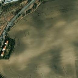 Satellite imagery of [Praha-Běchovice] former heat plant chimney, CZ