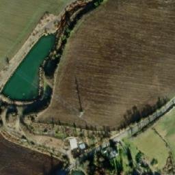 Satellite imagery of [Unhošť] former brewery chimney, CZ