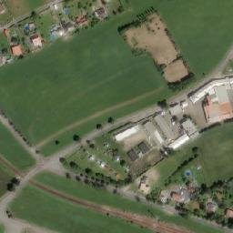 Satellite imagery of [Dlouhoňovice] former milk factory chimney, CZ