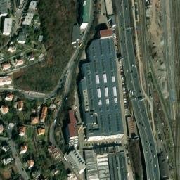 Satellite imagery of [Praha-Smíchov] former distillery chimney, CZ