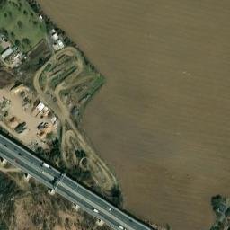 Satellite imagery of [Praha-Radotín] former state farm chimney, CZ