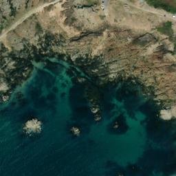 Satellite imagery of Jument Rock, JE