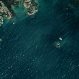 Satellite imagery of Jument Rock, JE