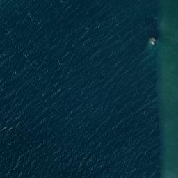 Satellite imagery of Roussé Rock, JE