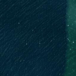 Satellite imagery of Roussé Rock, JE