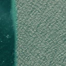 Satellite imagery of Roussé Rock, JE