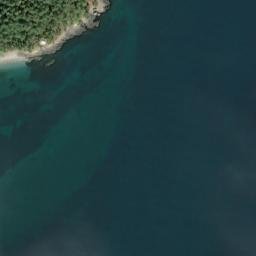 Satellite imagery of Delacombe Point, US