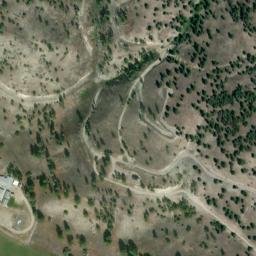 Satellite imagery of Woodman Mine, US