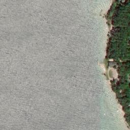 Satellite imagery of Omena Point, US