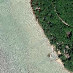 Satellite imagery of Omena Point, US