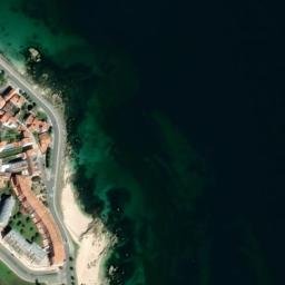 Satellite imagery of Punta Touro, ES