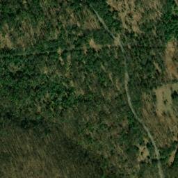 Satellite imagery of Woodward Mountain, US