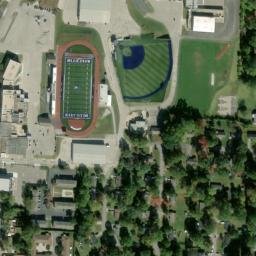 Satellite imagery of RAYTOWN E 63RD ST MUN TANK — NGS KE1385, US