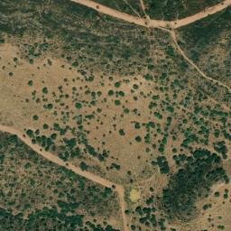 Satellite imagery of Cerro de las Mangadas, ES