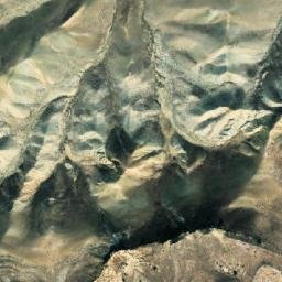 Satellite imagery of Khrebet Malyy Kulmach, TM