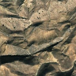 Satellite imagery of Khrebet Malyy Kulmach, TM