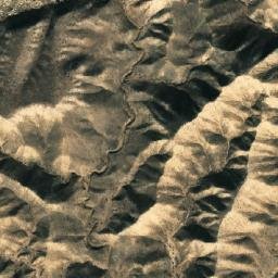 Satellite imagery of Khrebet Malyy Kulmach, TM