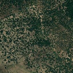 Satellite imagery of Sierra de la Asomada, ES