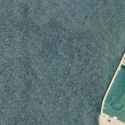 Satellite imagery of Punta Pezzo, IT