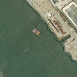 Satellite imagery of Commission Rock (historical), US