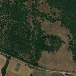 Satellite imagery of Koudiet es Sekhra, DZ