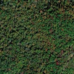 Satellite imagery of Brokedown Cliff, US
