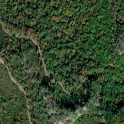 Satellite imagery of Brokedown Cliff, US