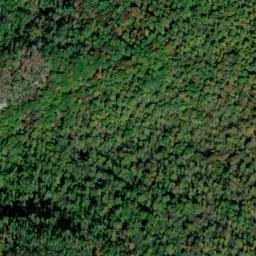 Satellite imagery of Brokedown Cliff, US