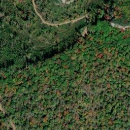 Satellite imagery of Brokedown Cliff, US