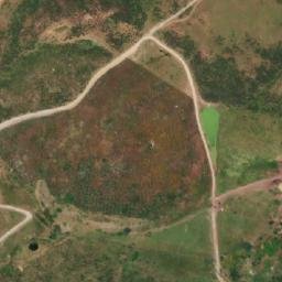 Satellite imagery of Koudiat el Khamess, DZ