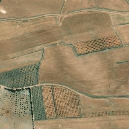 Satellite imagery of Tallat al Khashākhīsh, SY
