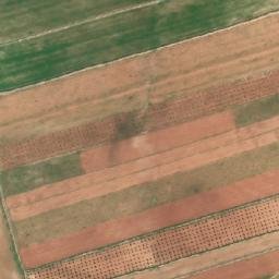 Satellite imagery of Tallat al Khashākhīsh, SY