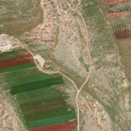 Satellite imagery of Z̧ahr al Wasiţānī, SY