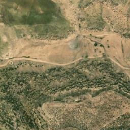 Satellite imagery of Koudiat er Rahia, DZ
