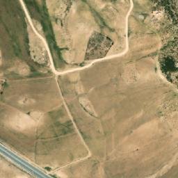 Satellite imagery of Koudiat er Rahia, DZ
