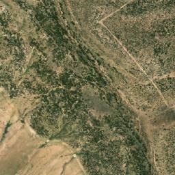 Satellite imagery of Koudiat er Rahia, DZ
