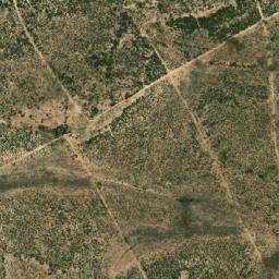 Satellite imagery of Koudiat er Rahia, DZ