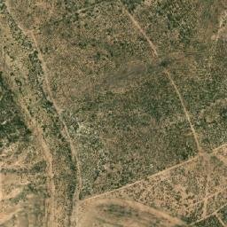 Satellite imagery of Koudiat er Rahia, DZ